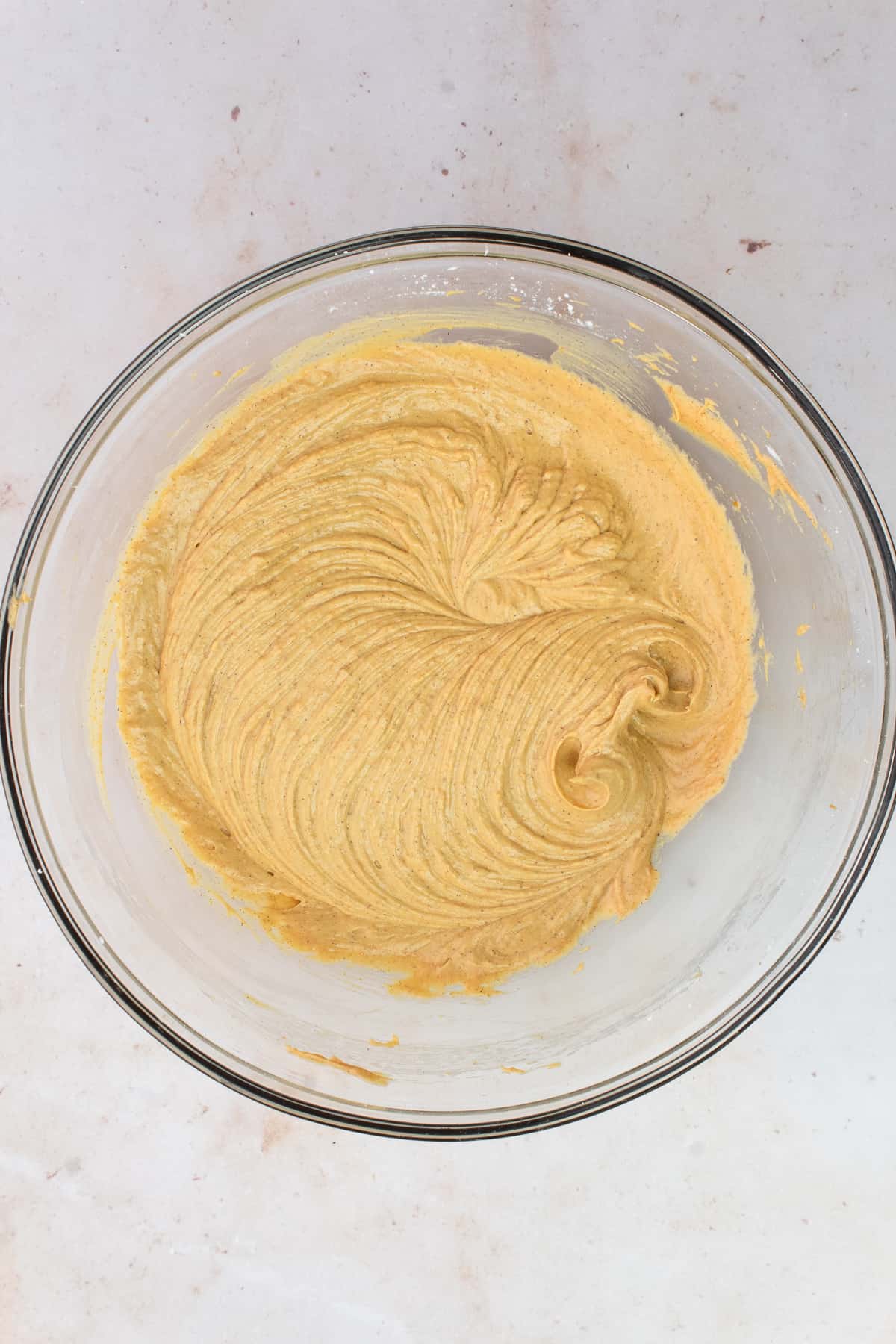 A bowl of pumpkin biscoff cheesecake filling