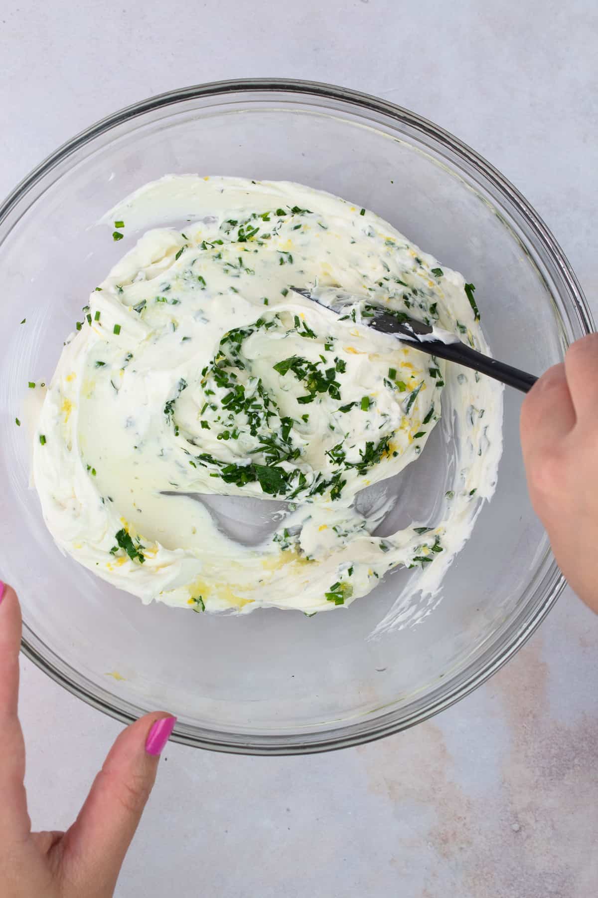 Ingredients in cream cheese mixture being folded together