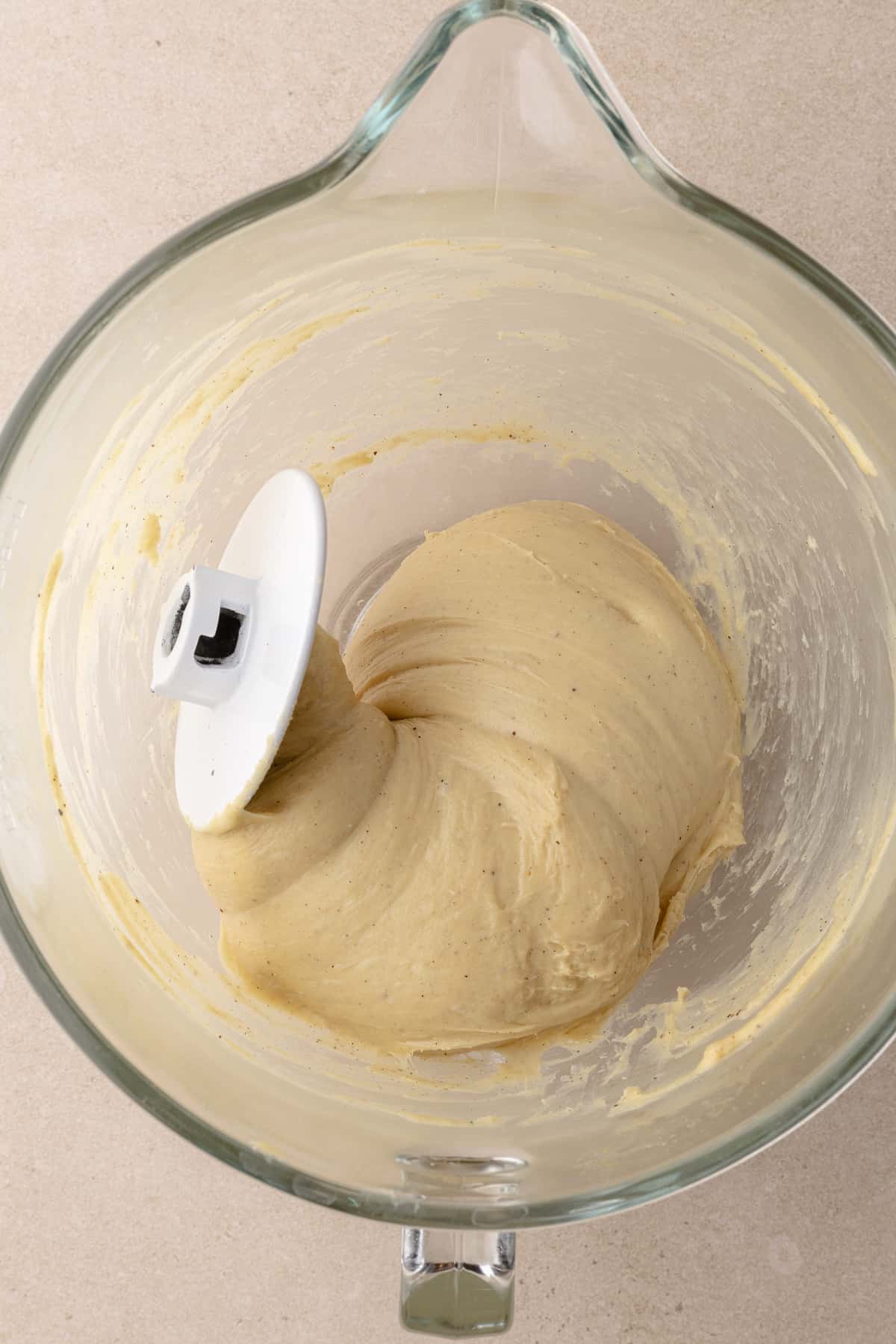 Kneaded dough in large mixing bowl