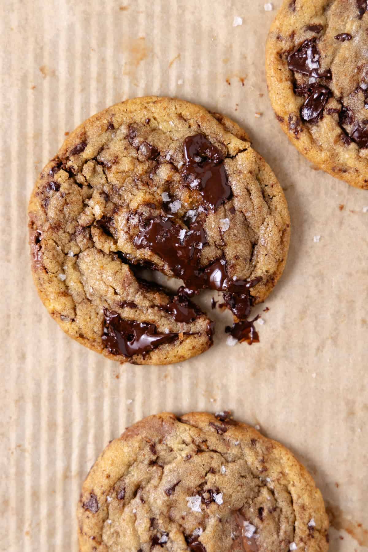 Brown butter chocolate chip cookies on a baking tray.