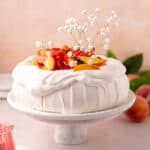 Peach melba pavlova featured photo.