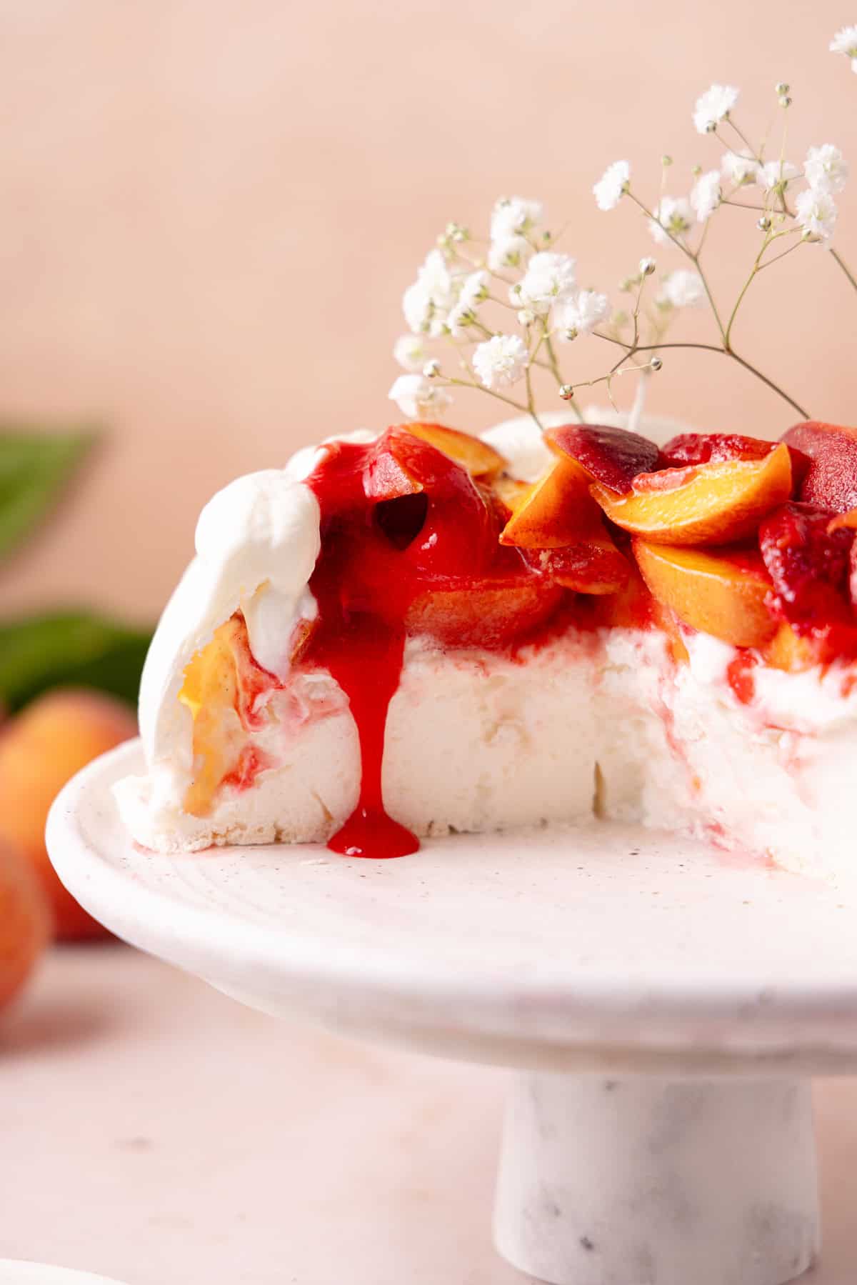 Inside of peach melba pavlova.