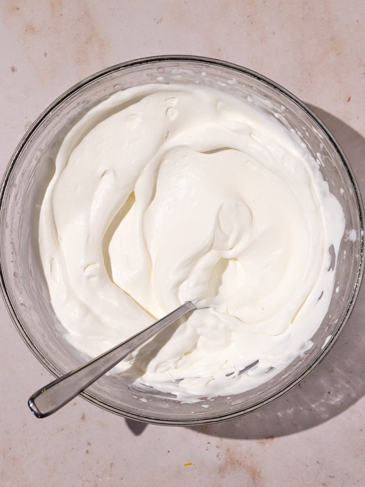 Heavy cream is whipped to medium peaks.