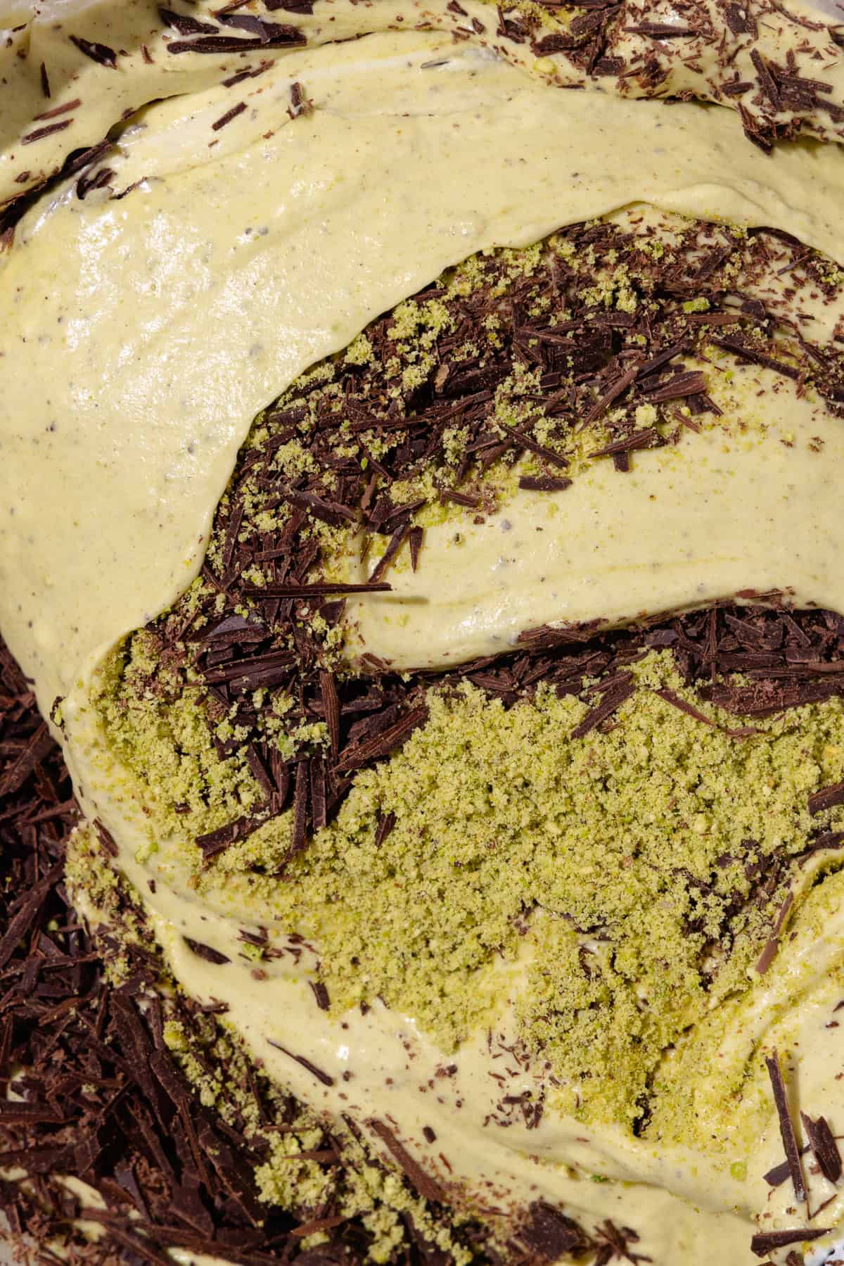 Finely chopped chocolate and ground pistachios are added to semifreddo base.