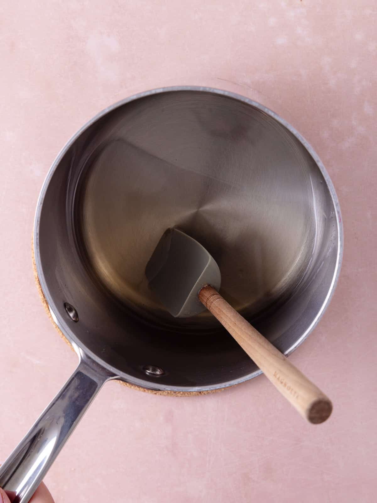 Almond vanilla syrup in a small saucepan.