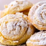 A pile of almond croissant muffins featured photo.