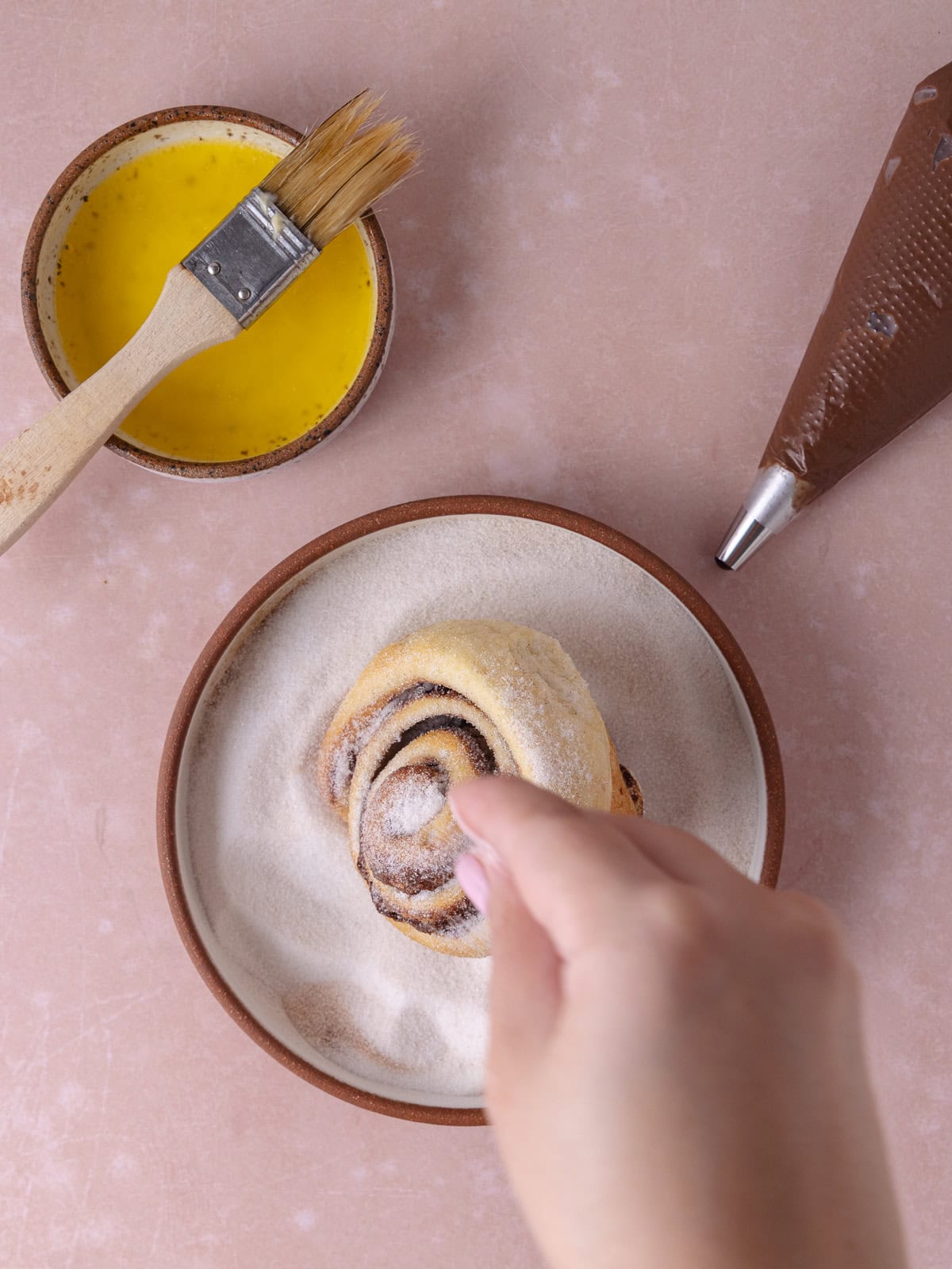 Nutella roll is coated in cinnamon sugar.