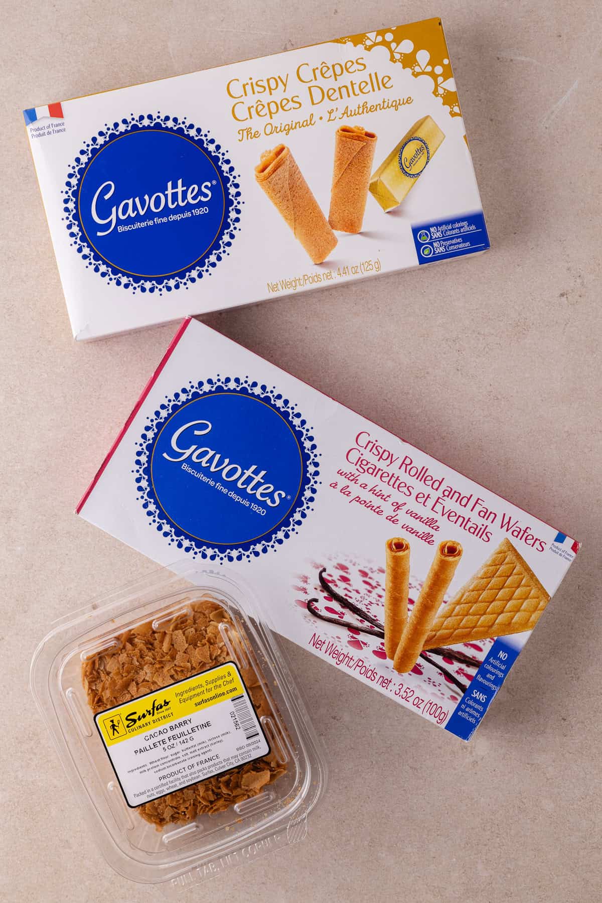 Boxes of Gavottes cookies and a tub of paillete feuilletine.