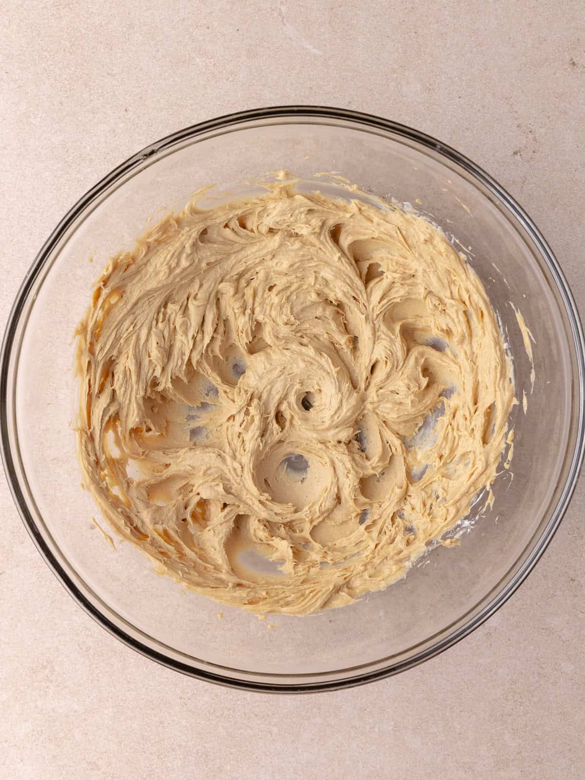 Cookie butter, cream cheese, butter, vanilla and salt are whisked together.