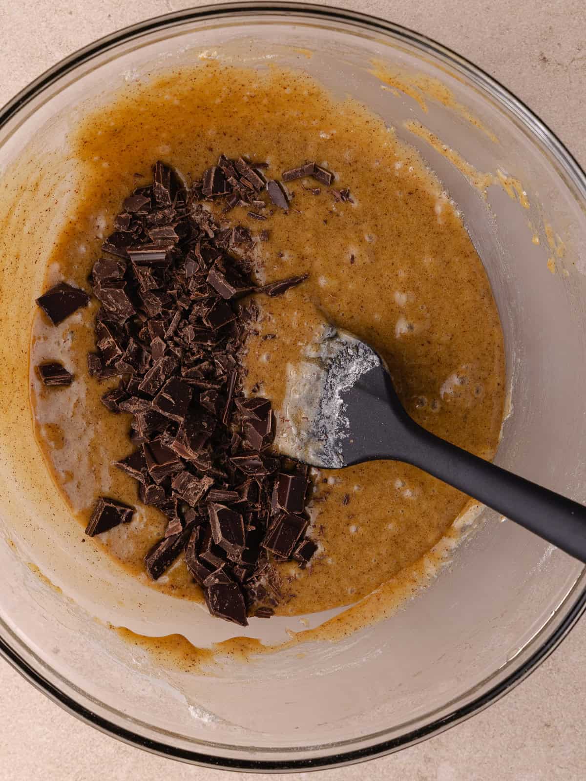 Chopped chocolate added to the batter.