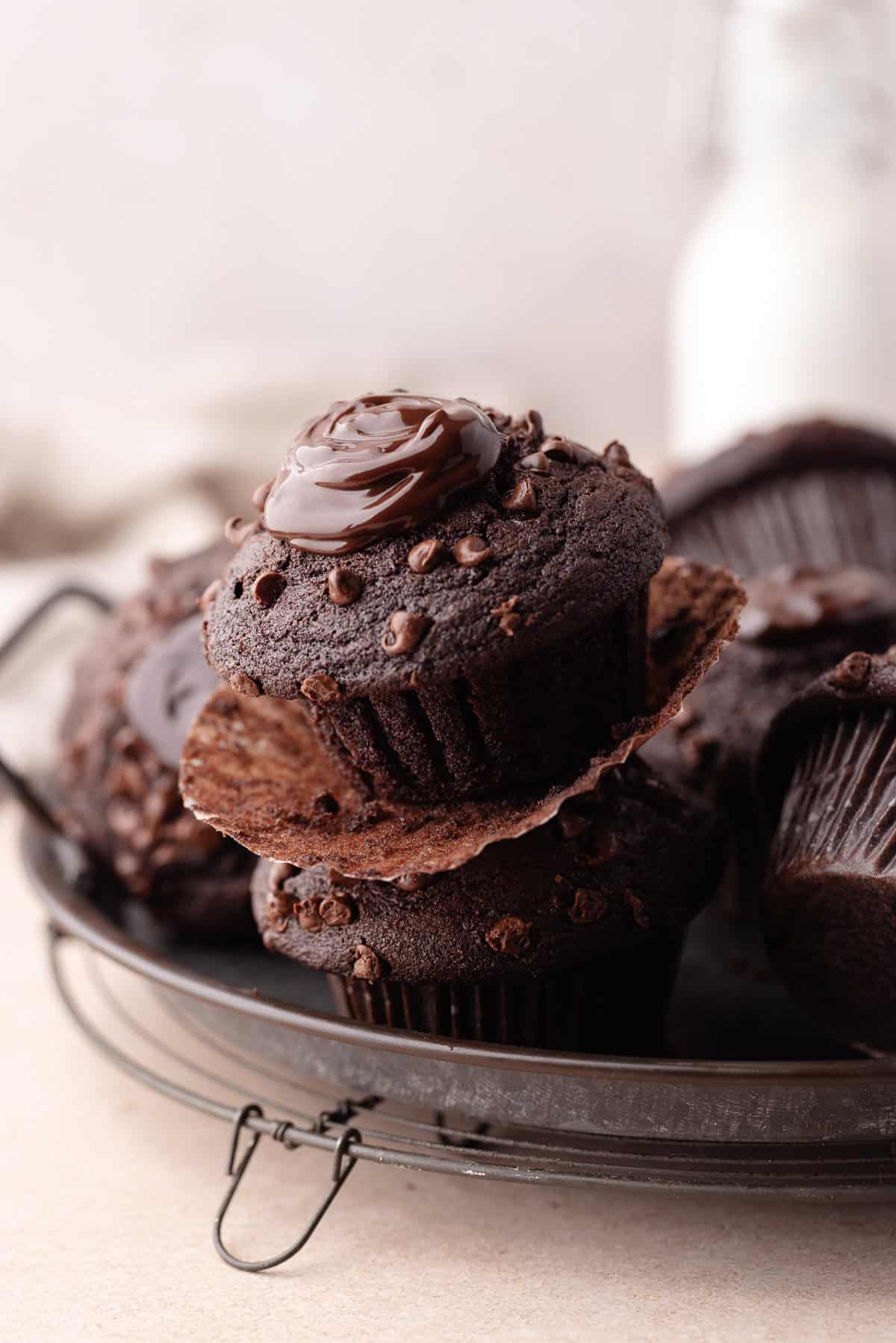 Triple chocolate muffins on serving tray.