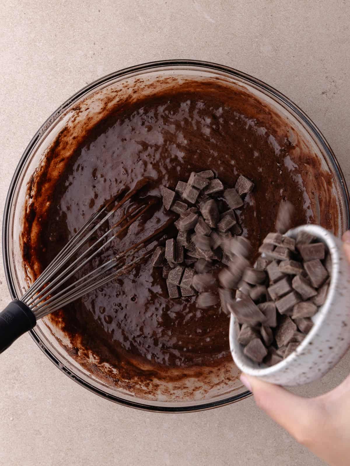 Chocolate chunks are added to the batter.