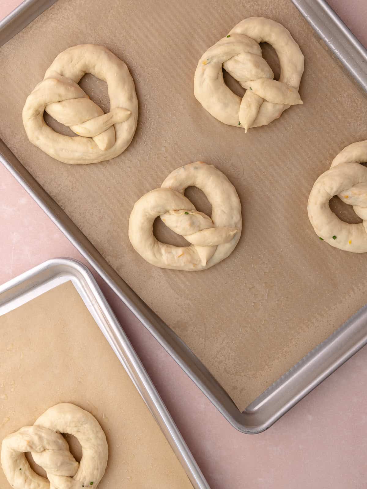 Shaped pretzels before rising.