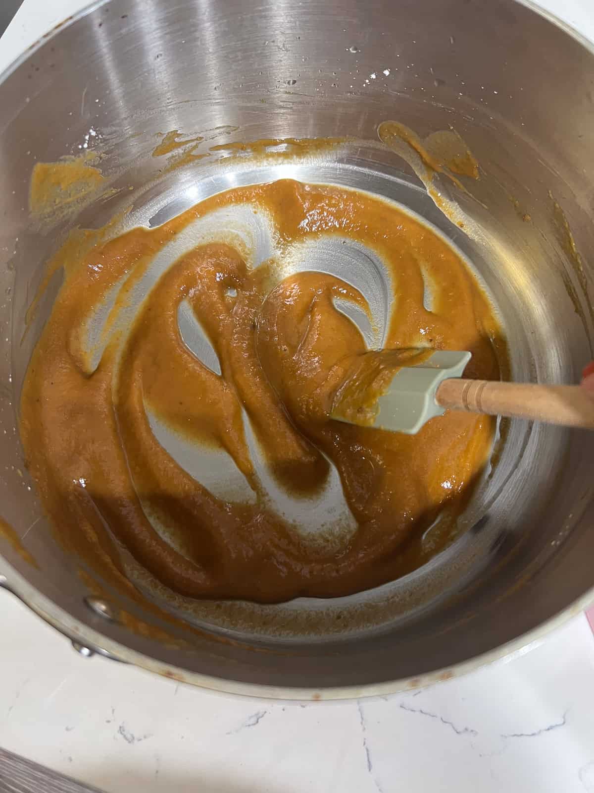 Pumpkin tapioca pearl dough before it is cooked in a pan.