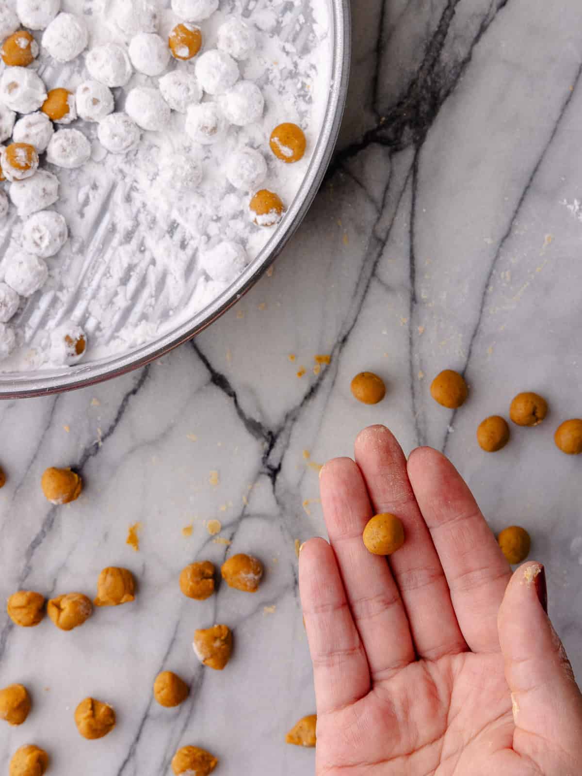 Pumpkin boba pearls are shaped into small balls.