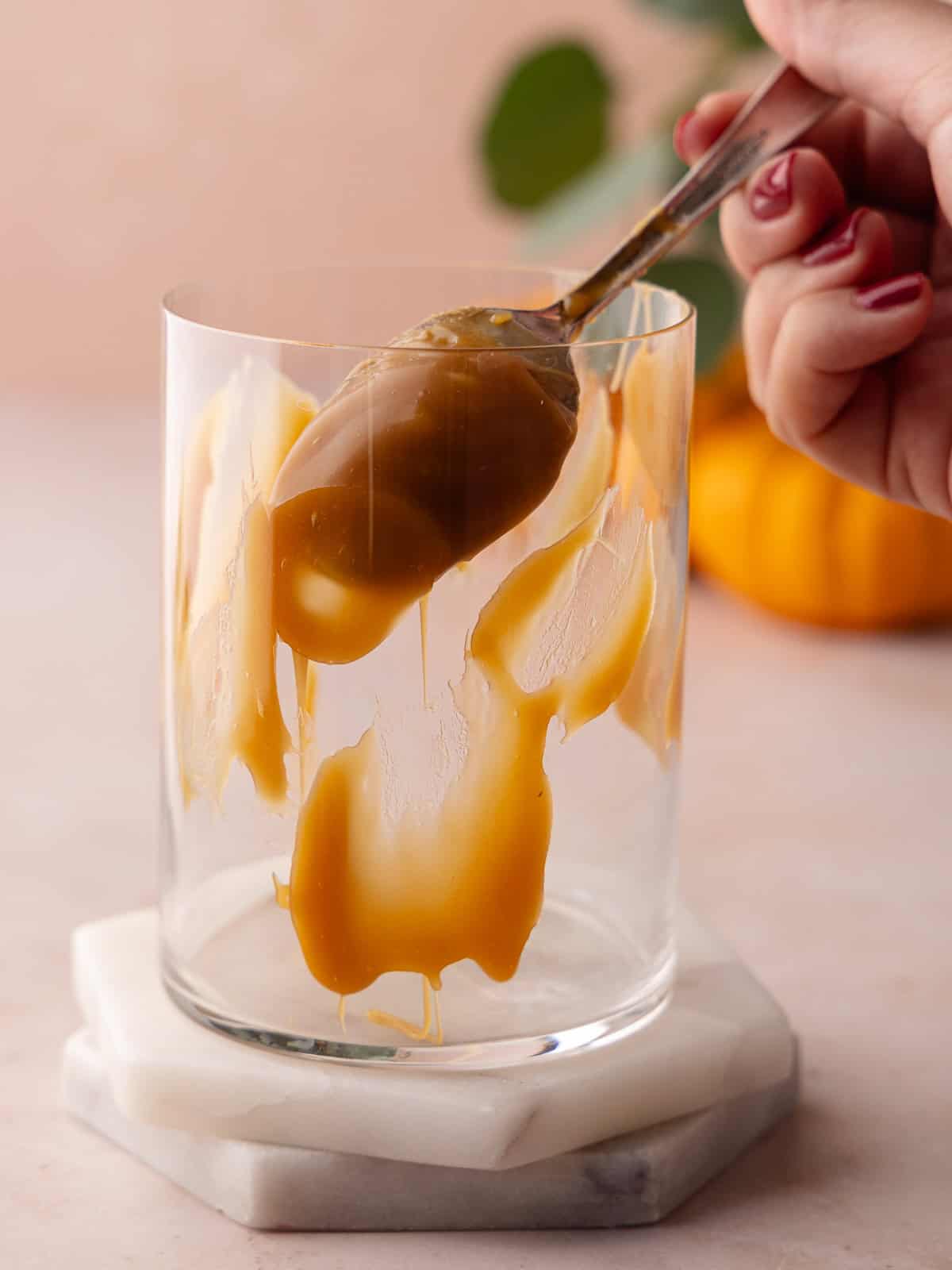 Salted caramel is smeared on the inside of the glass.