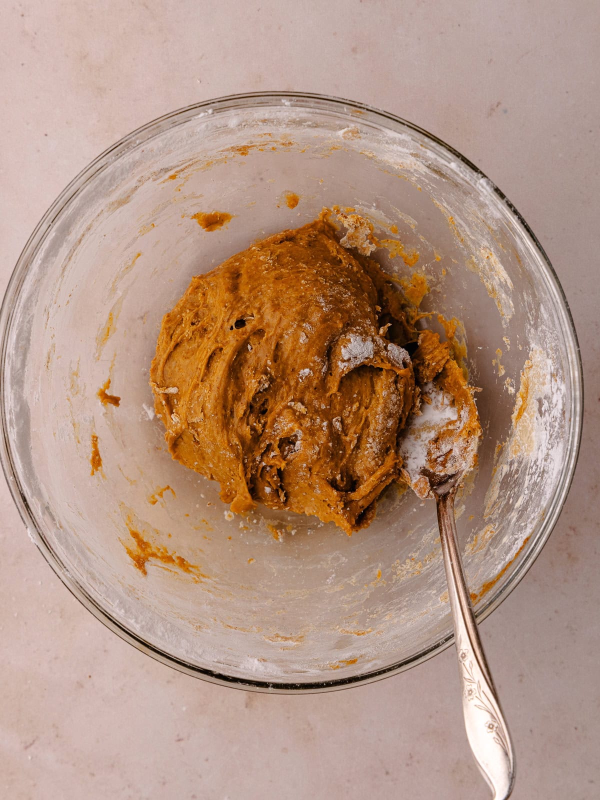 Dough is kneaded in a small bowl.