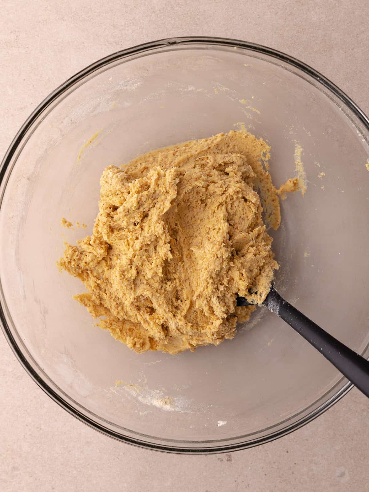 Captain crunch cookie dough is in a large glass bowl.