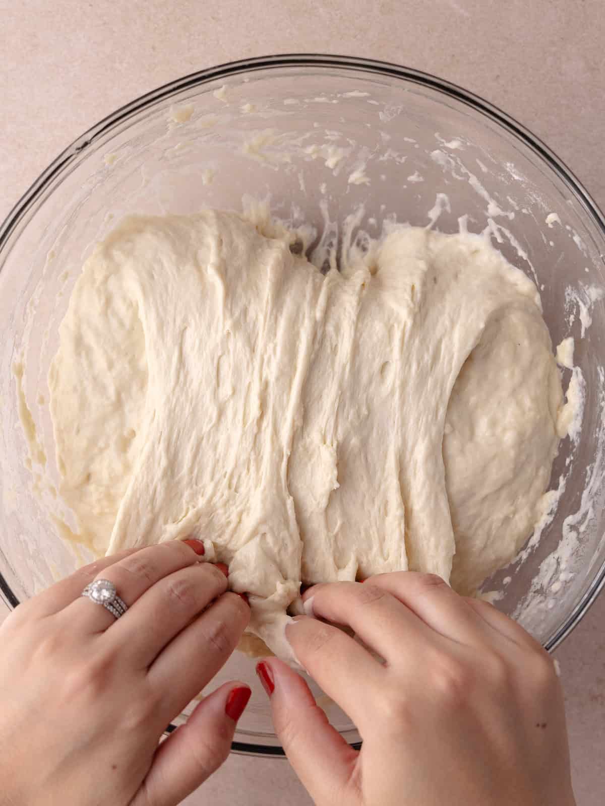 The dough is folded on top of itself.