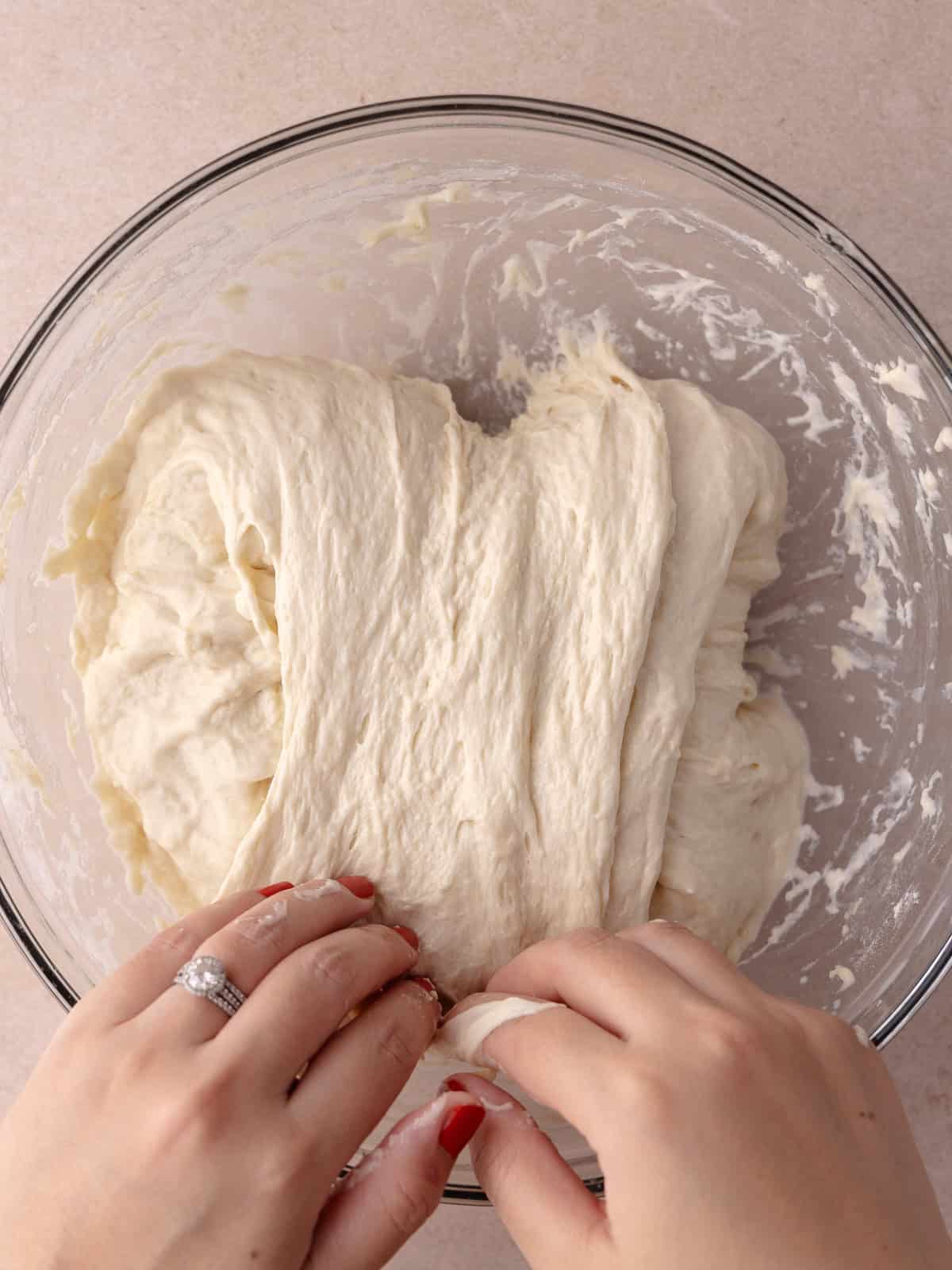 The dough is folded on top of itself.