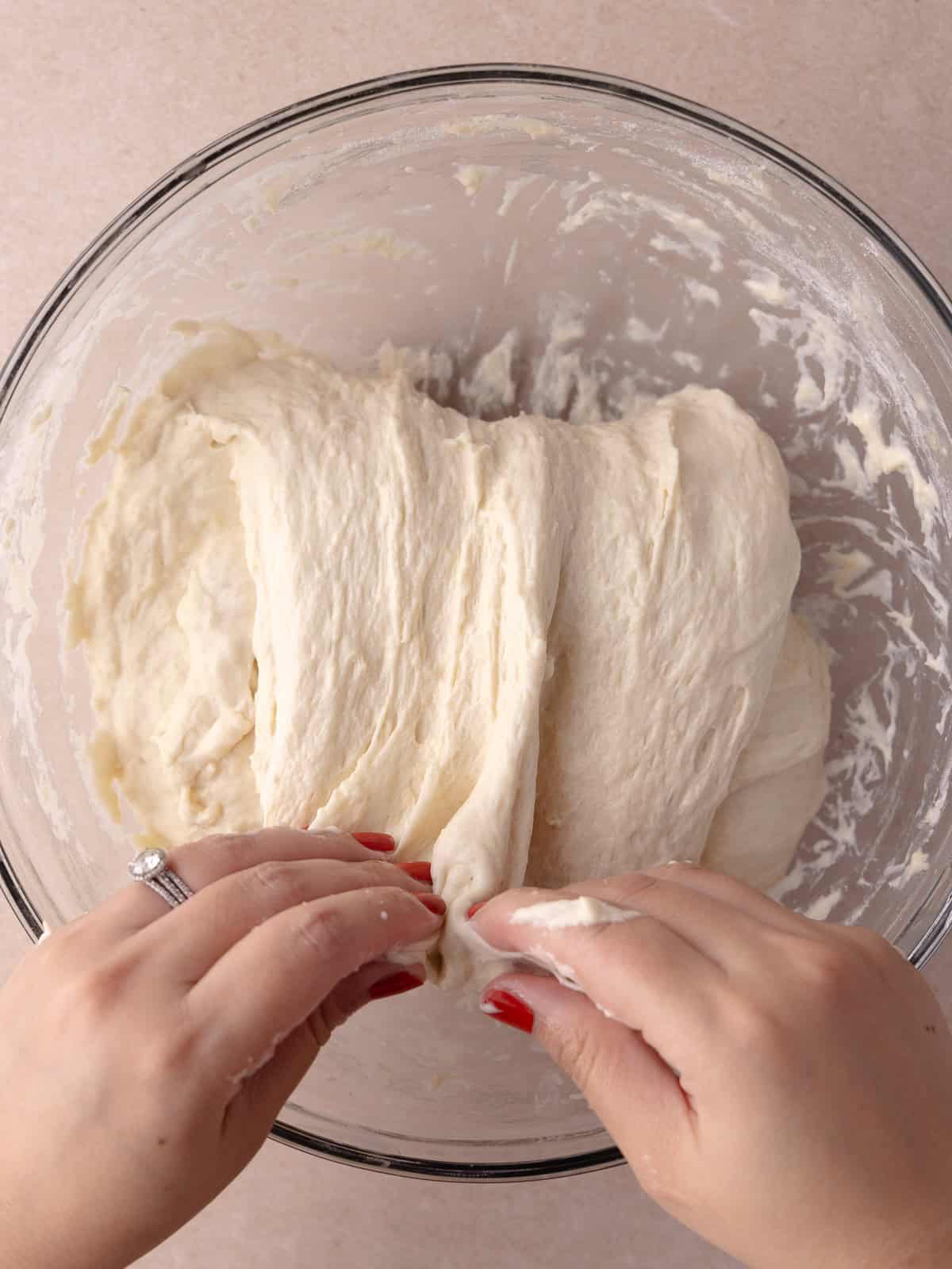 The dough is folded on top of itself.