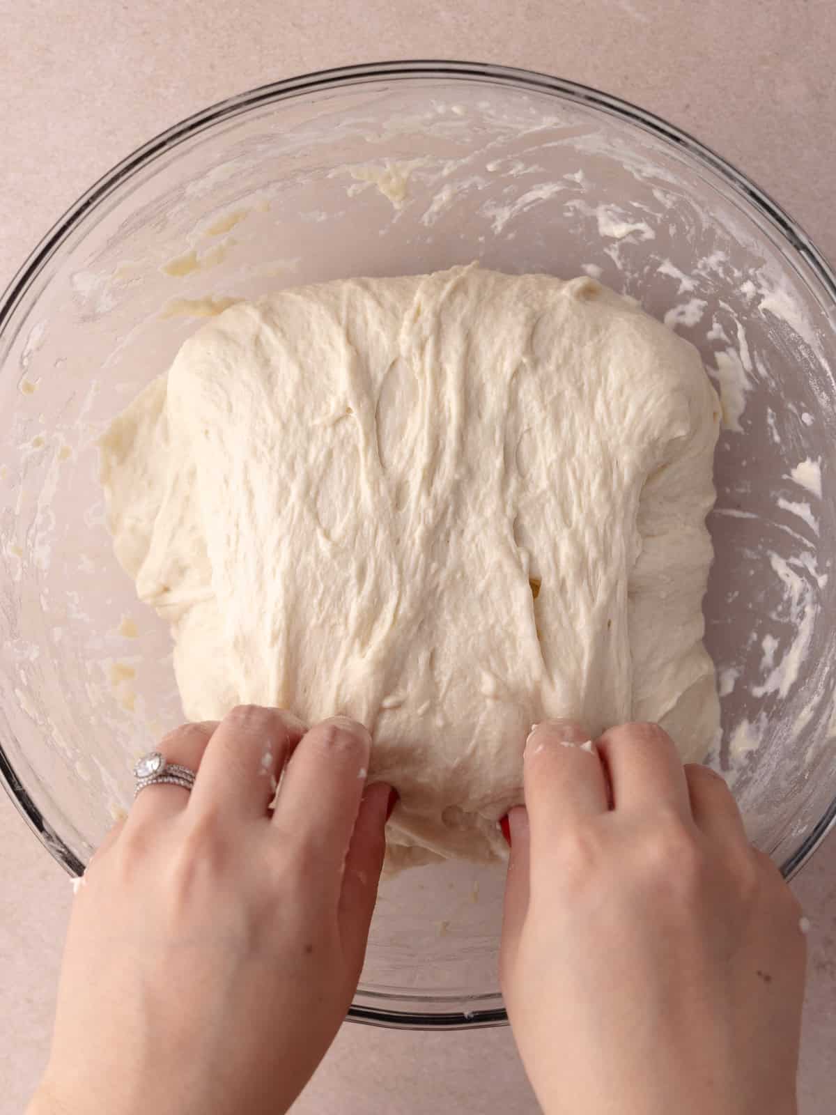 The dough is folded on top of itself.