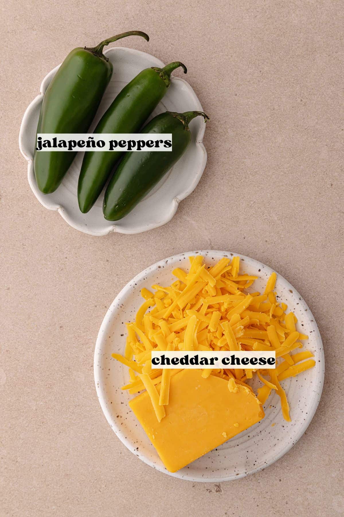 Jalapeno Cheddar Bagel ingredients toppings which include cheddar cheese and fresh jalapeno peppers.