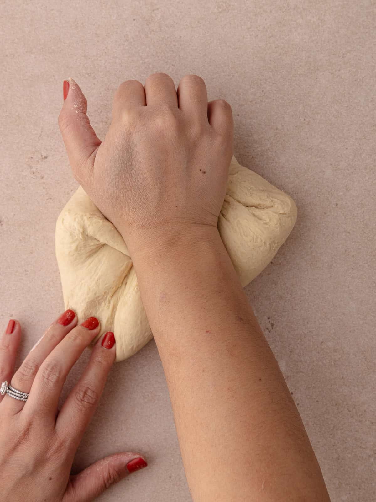 The bagel dough kneaded by hand.