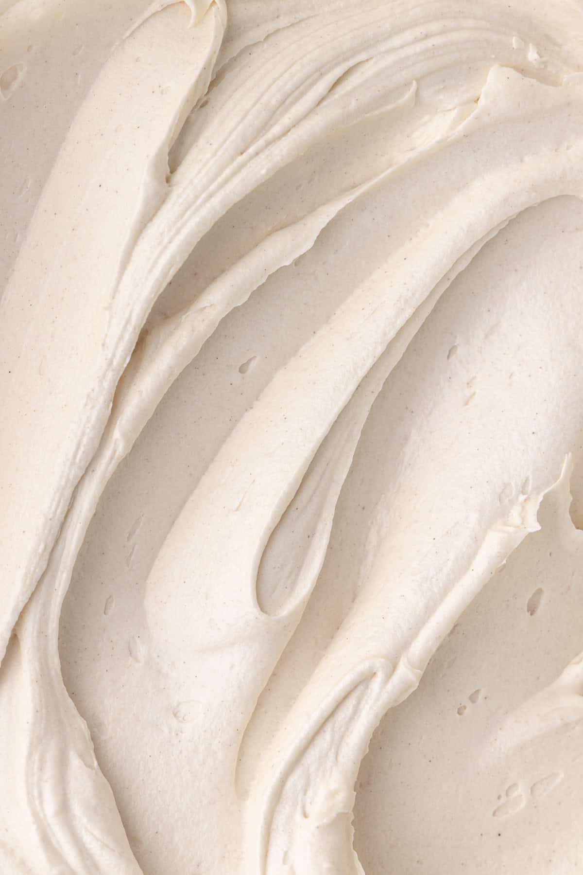 Close up of cinnamon maple cream cheese frosting.