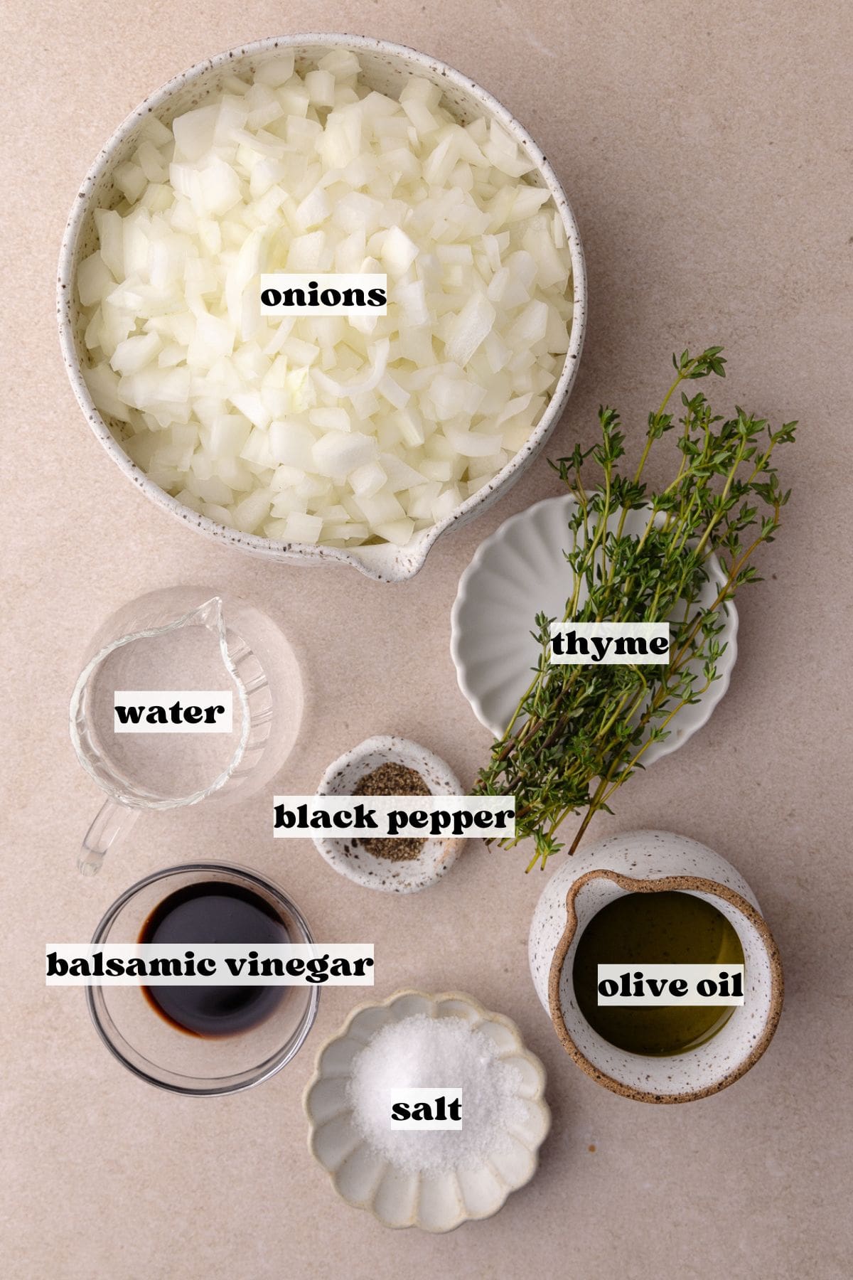 Caramelized onions ingredients which include, diced onions, fresh thyme, extra-virgin olive oil, salt, black pepper, water and balsamic vinegar.