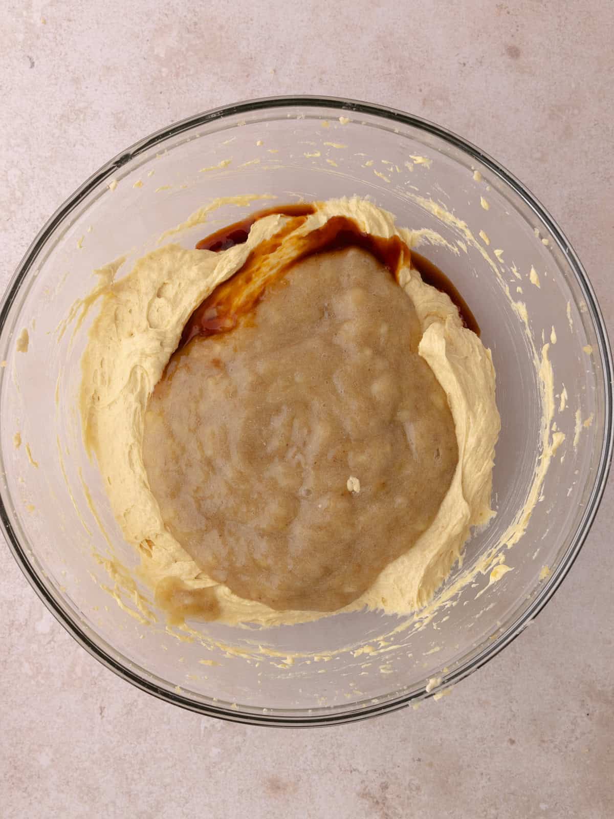 Mashed bananas and vanilla extract is added to the the sugar, butter, egg mixture.