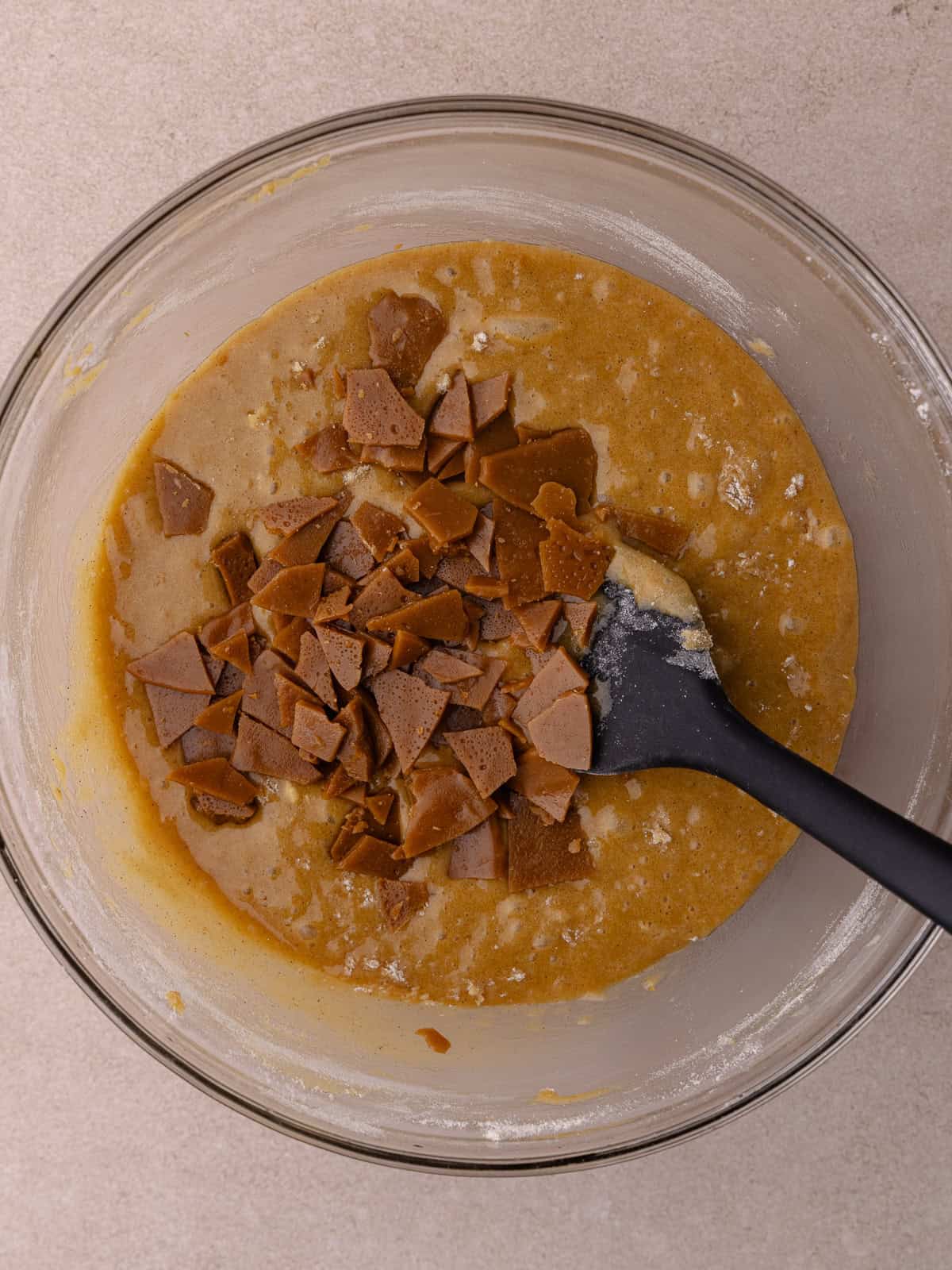 Homemade toffee bits are added to the blondie batter.