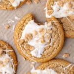 Soft and chewy cinnamon toast crunch cookies drizzled with white chocolate and crushed cinnamon toast crunch cereal featured photo.