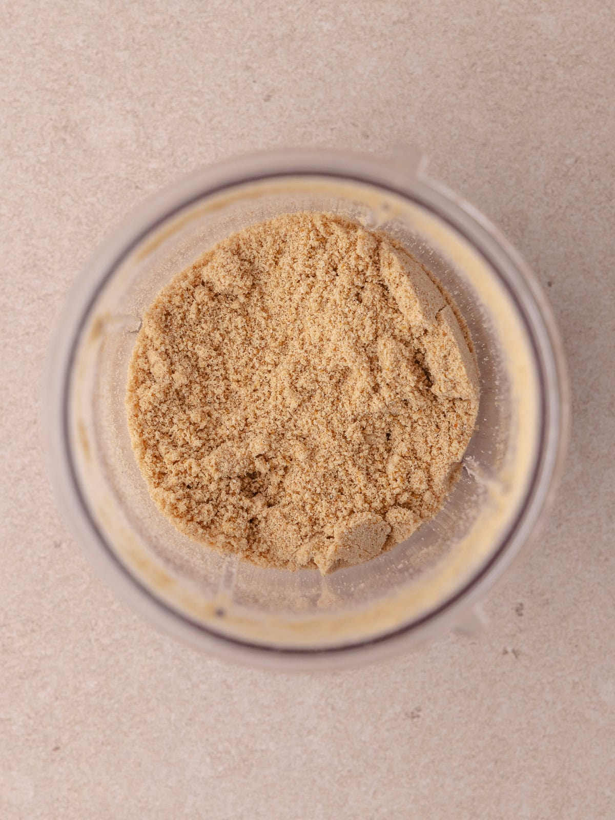 Cinnamon toast crunch cookies are finely ground into a powder.