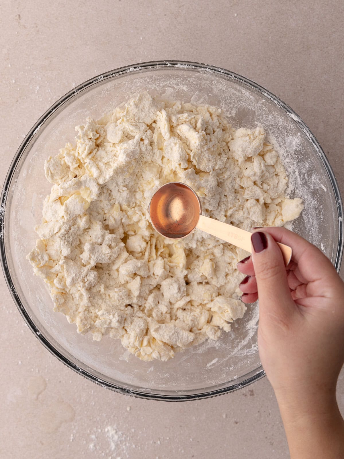 Cold Ice water is added to flour mixture.