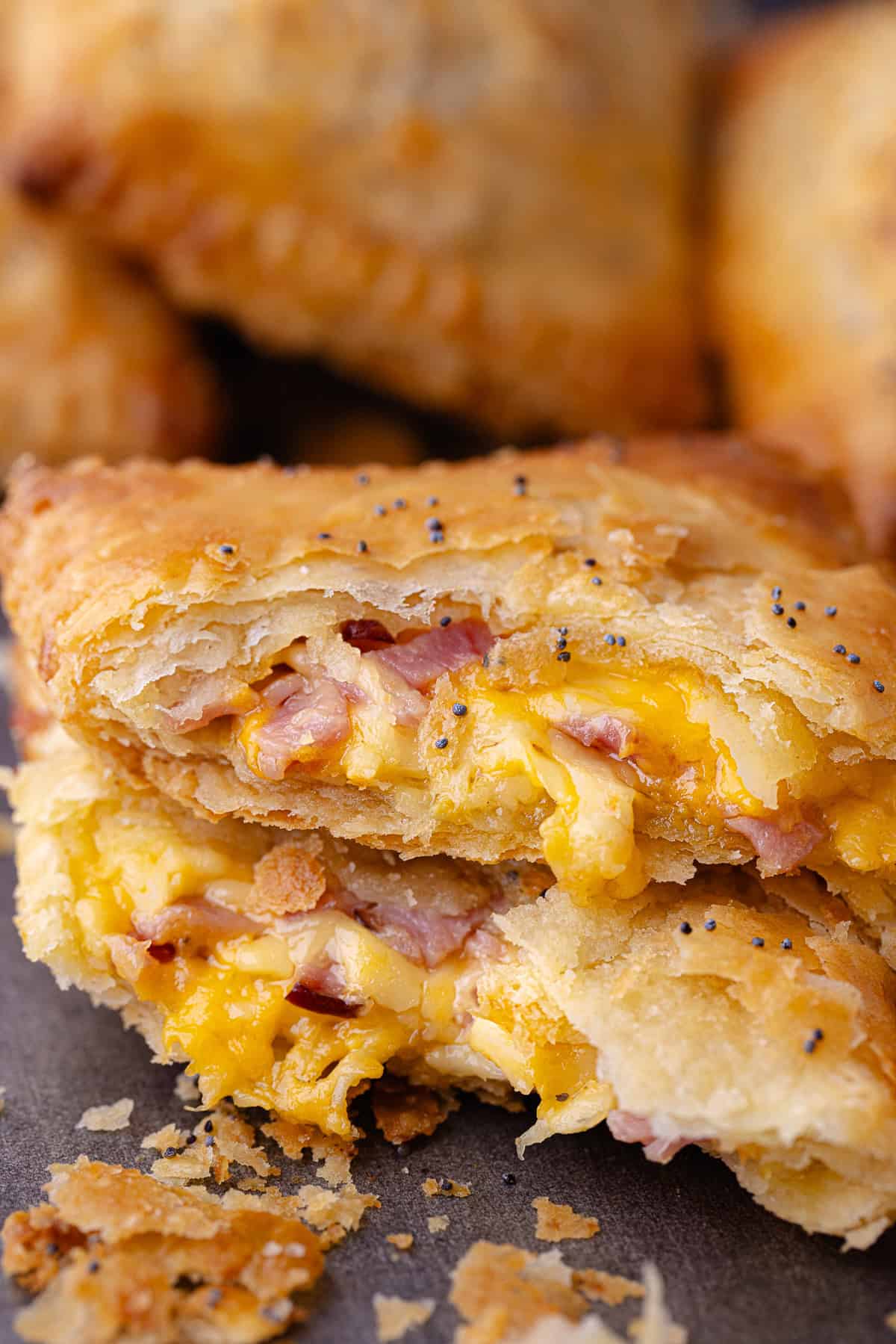 Ham and cheese hand pies on a serving platter.