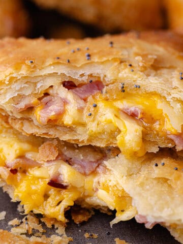 Ham and cheese hand pies on a serving platter feature photo.