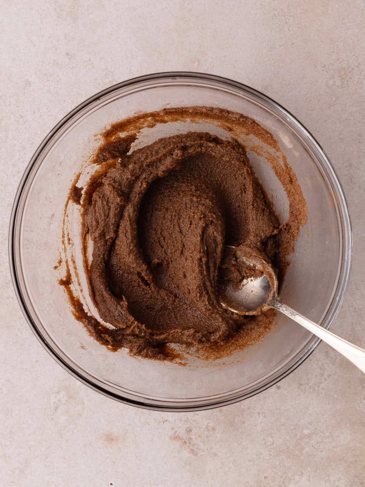 Softened butter, dark brown sugar and cinnamon are mixed together in a mixing bowl.