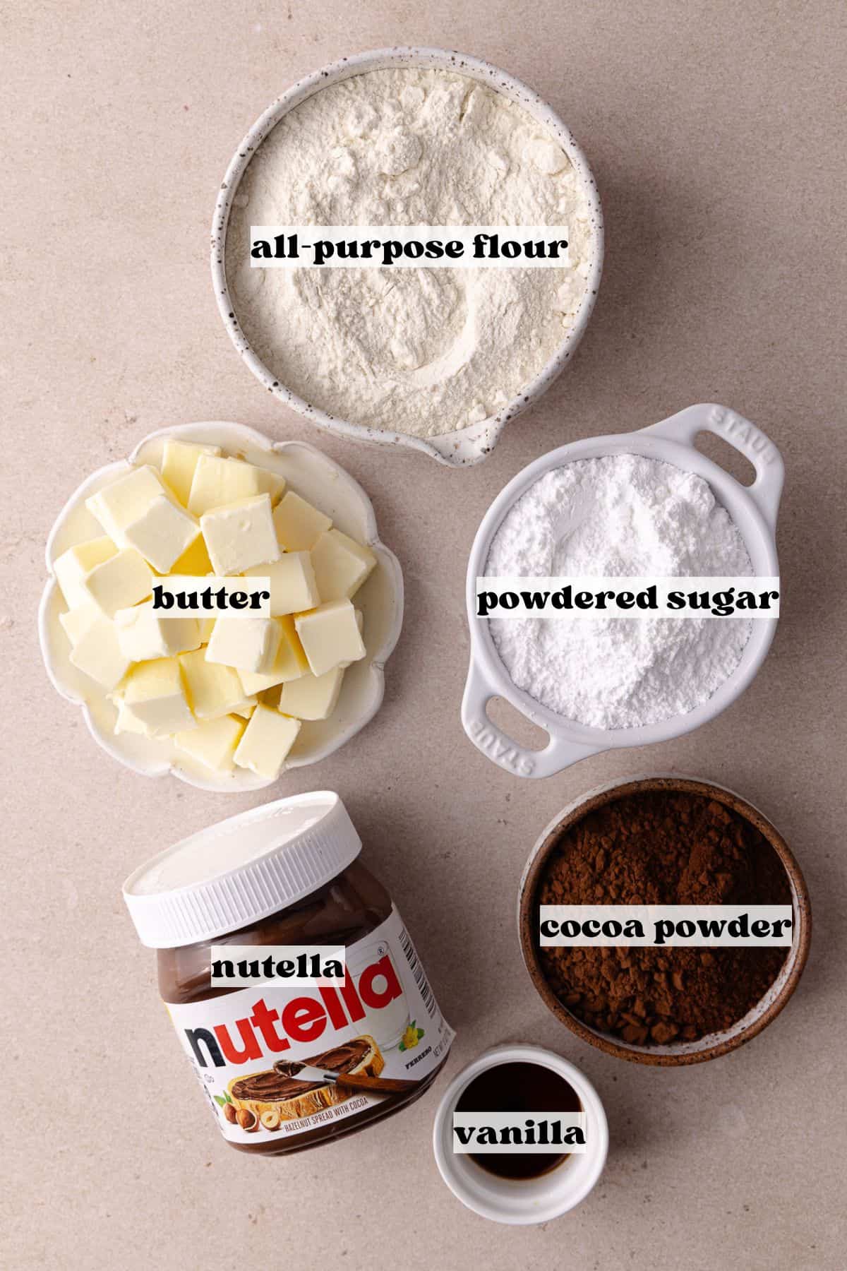 Nutella linzer cookies ingredients which include, butter, all-purpose flour, powdered sugar, cocoa powder, Nutella and vanilla.