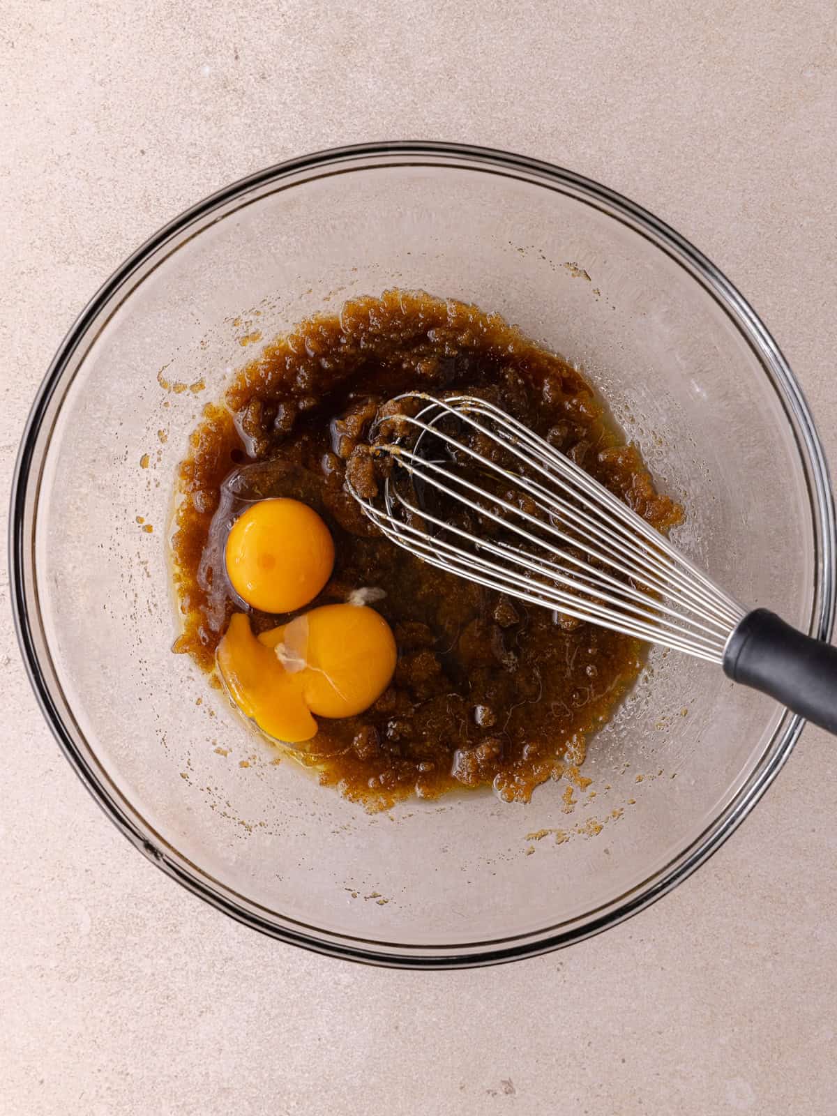 Egg and yolk are added to the butter/sugar mixture.