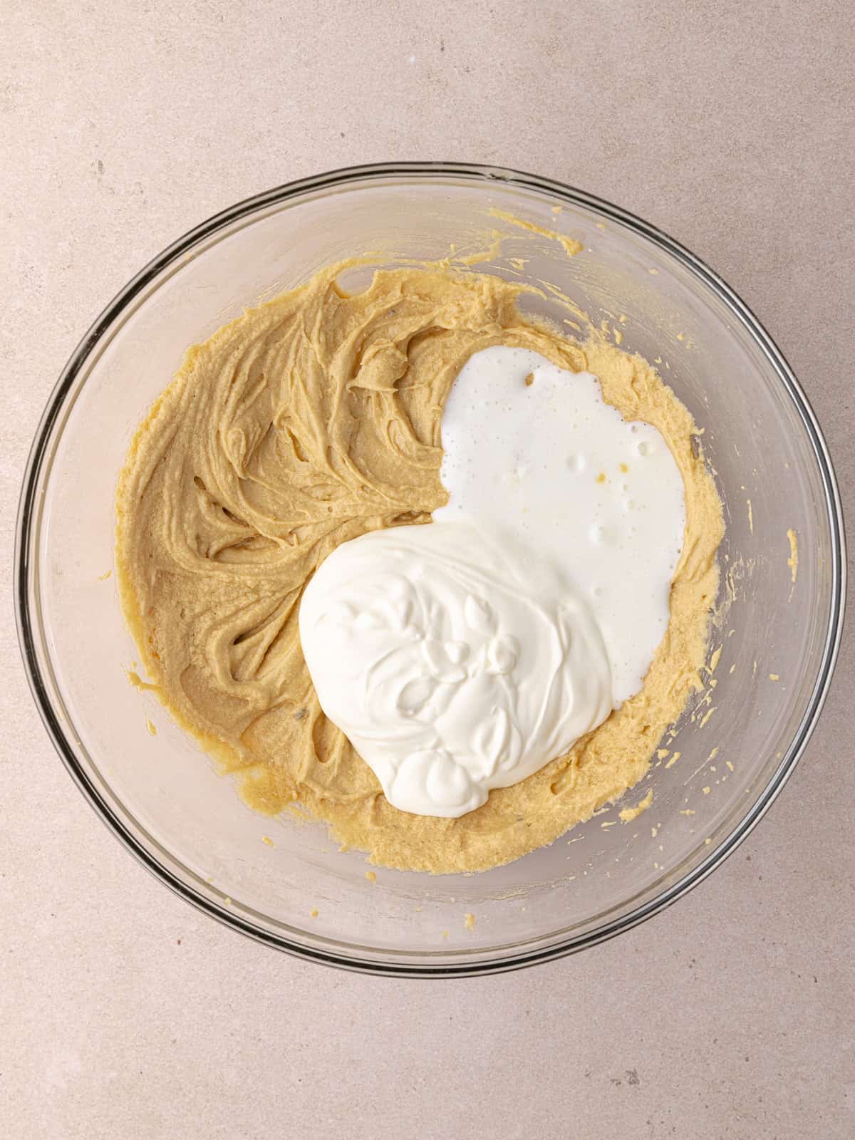 Sour cream and buttermilk is added to the butter, sugar and egg mixture.