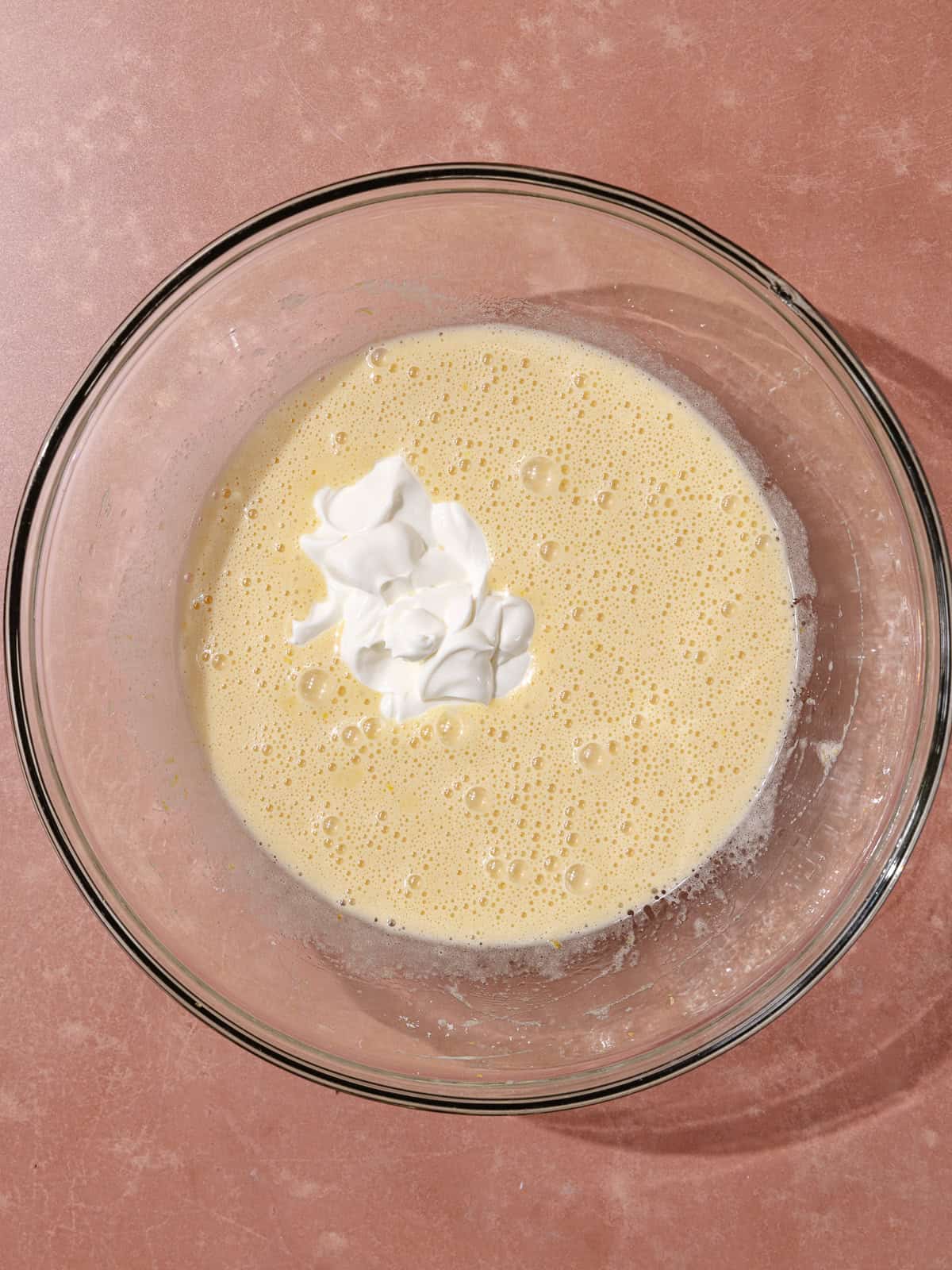 Sour cream is added to the lemon vanilla batter.