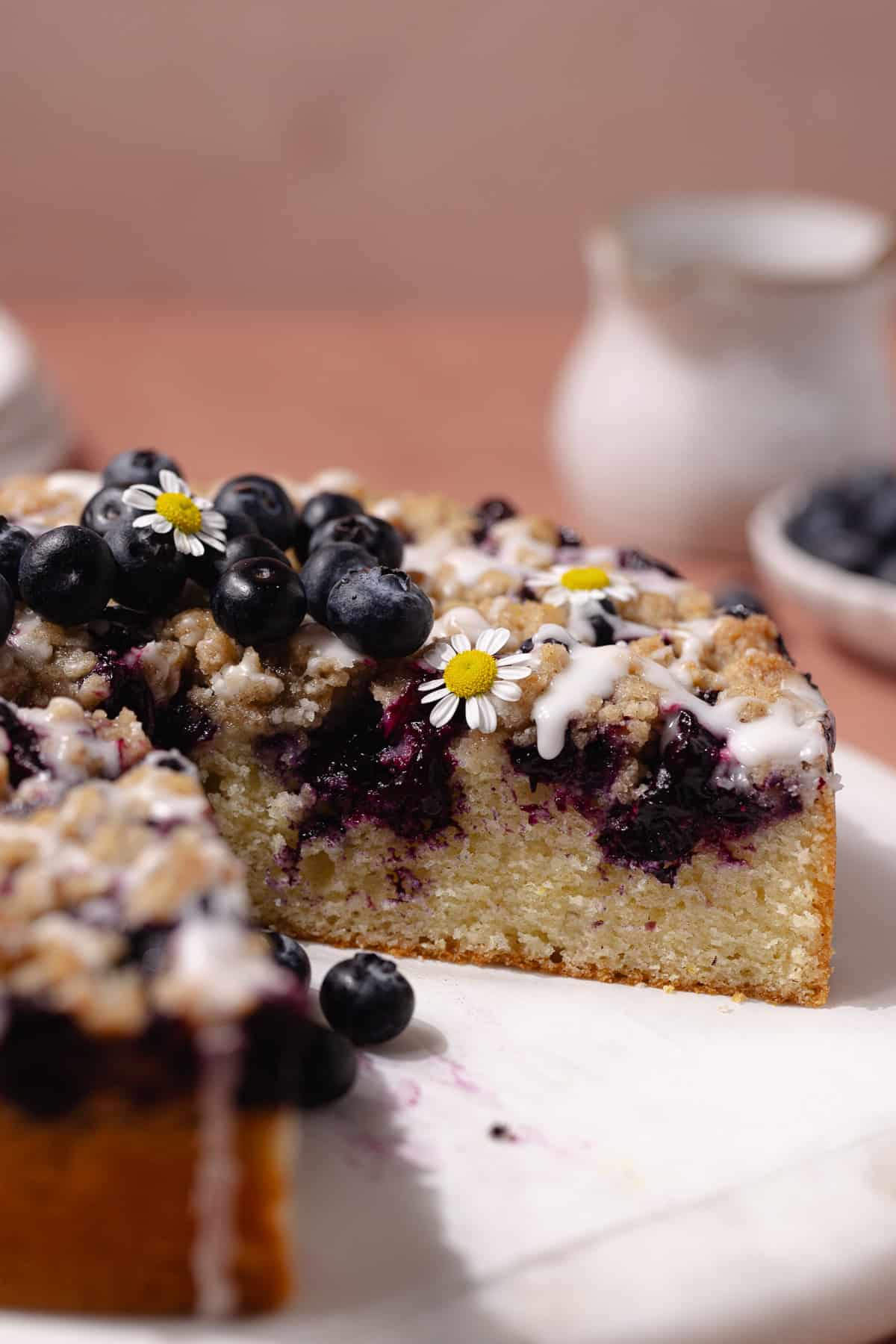 Blueberry lemon crumb cake on a serving platter.