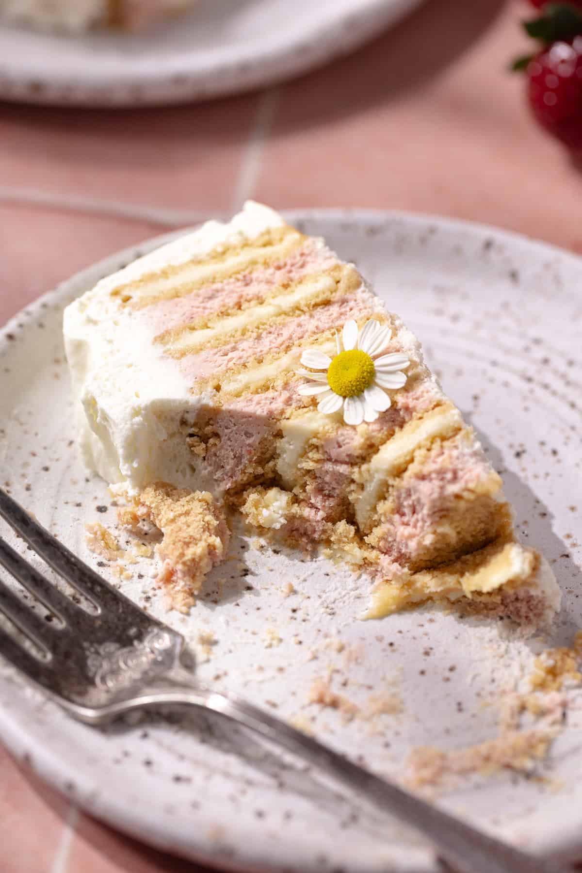 A slice of easy, no-bake strawberry icebox cake on dessert plate.