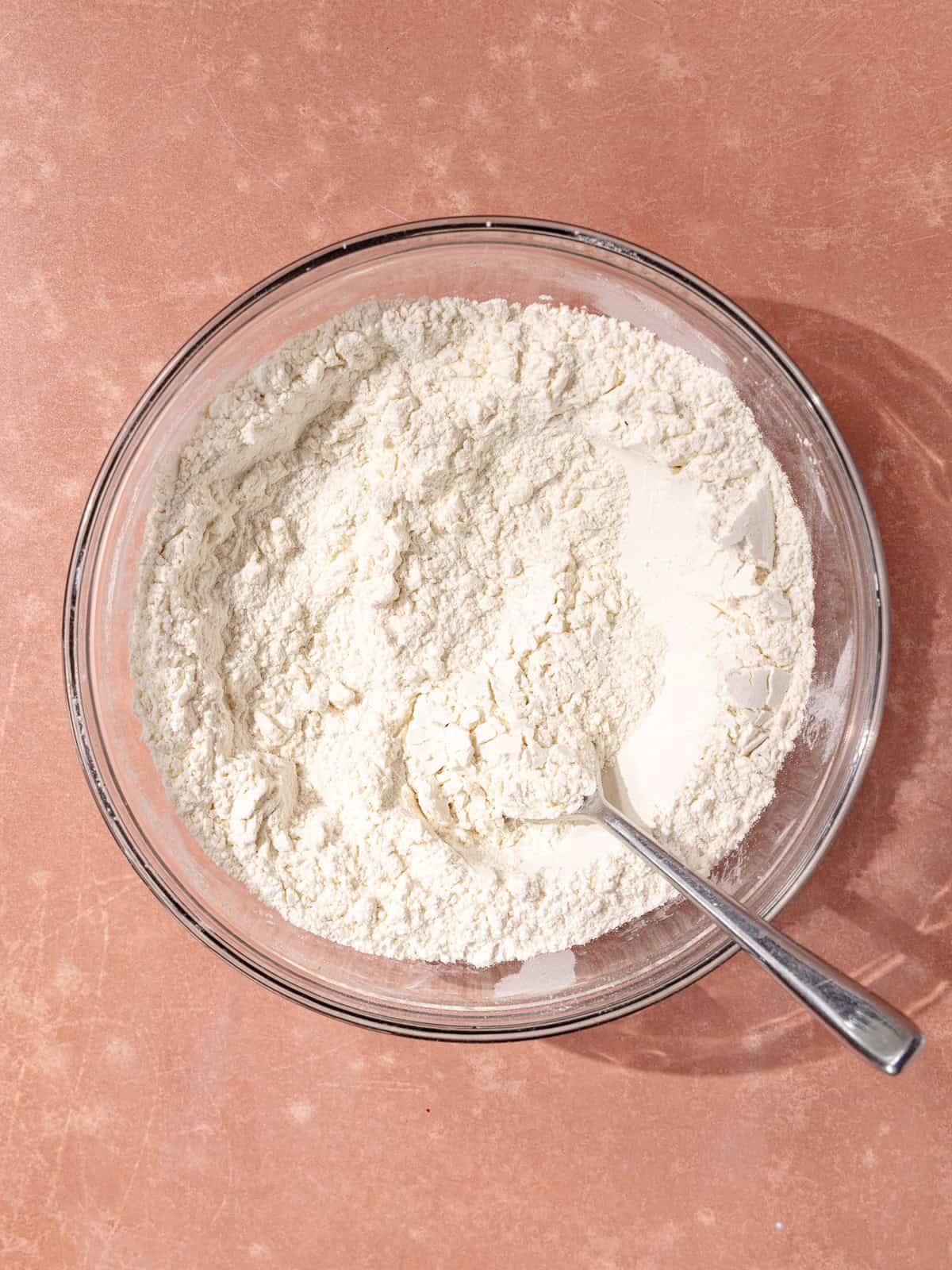 All-purpose flour, baking powder and salt are whisked together in a small bowl.